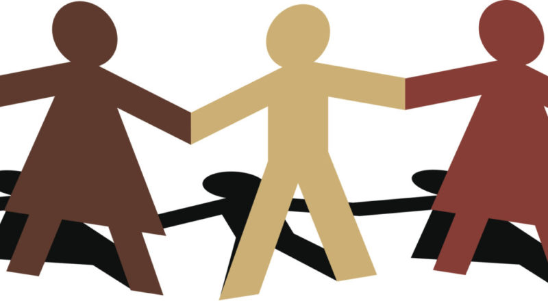 Vector illustration of male and female multi-racial paper cut figures standing in a row.