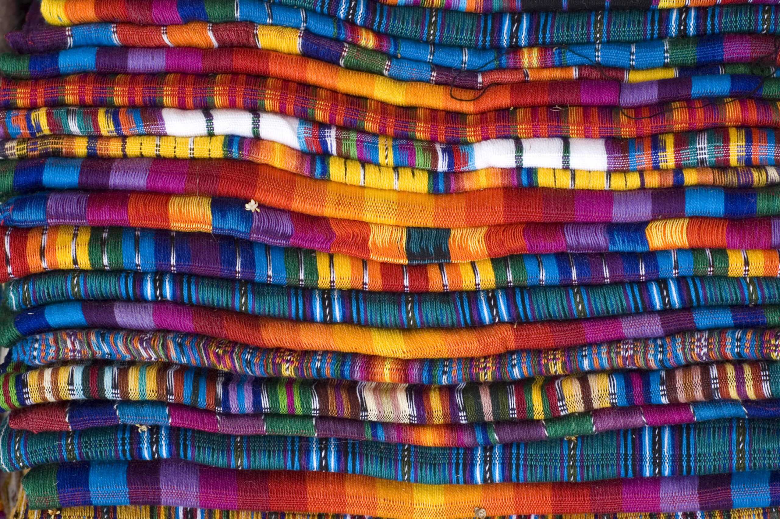 Mayan Blankets - Latinx Institute at Antioch University Multi-colored woven fabric